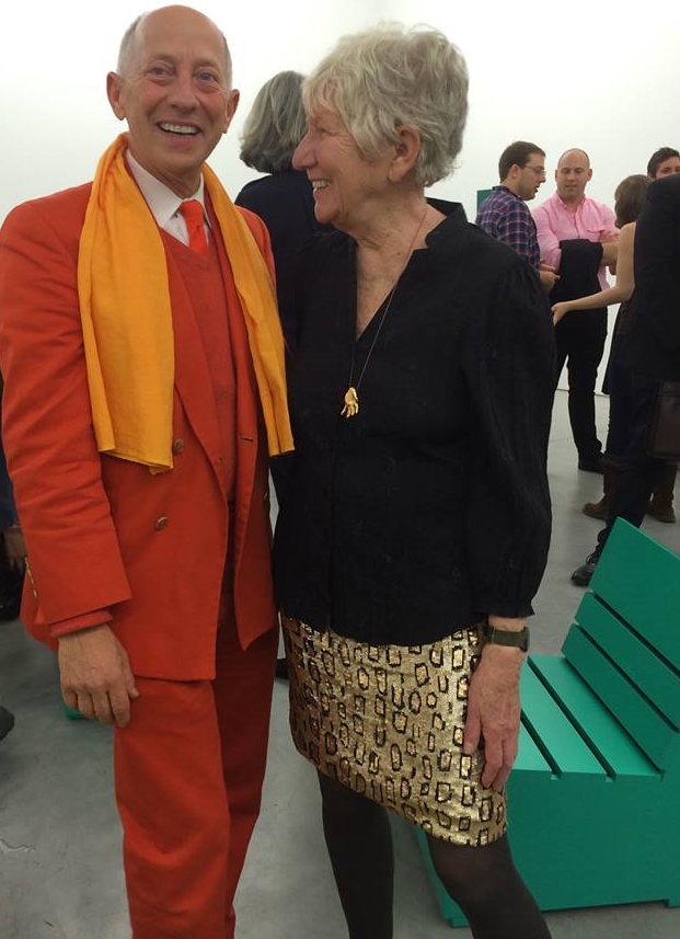 Mary Heilmann wearing leopard print sequin skirt at her show at 303 Gallery, with Knight Landesman wearing a suit of his own design