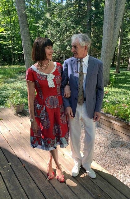 Eve Vaterlaus wearing my multi-print red Poppy dress and husband Donald Sheriden in Harbor Springs Michigan