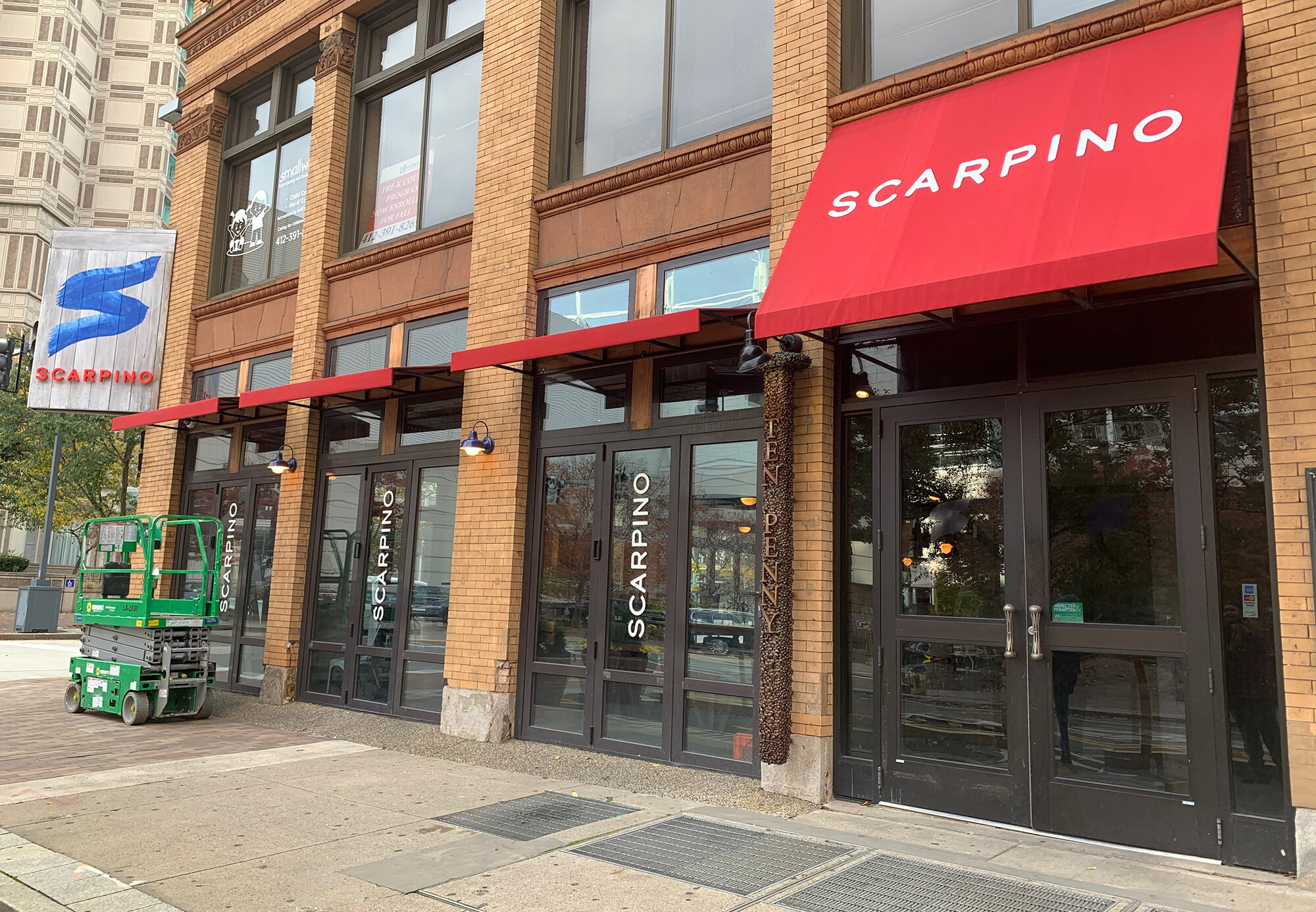 scarpino-exterior-awning-and-windows.jpg