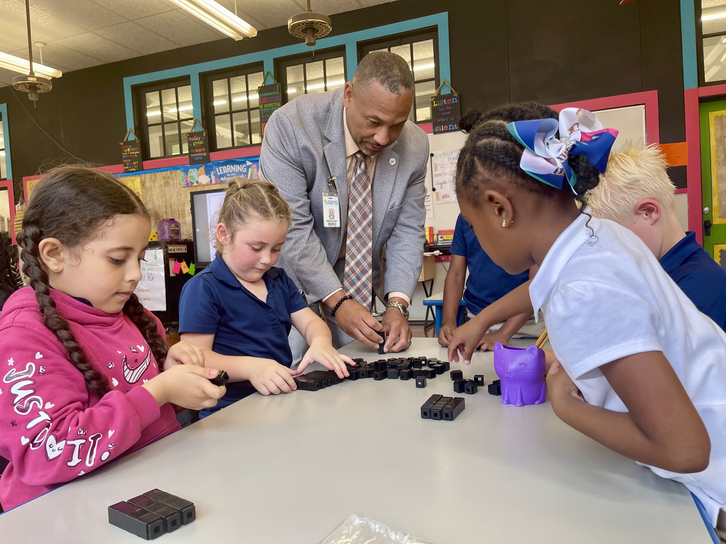  Superintendent Dr. John Barthelemy engages in a math learning exercise with fourth graders in Jennifer Aysen’s class at Napoleonville Elementary. 