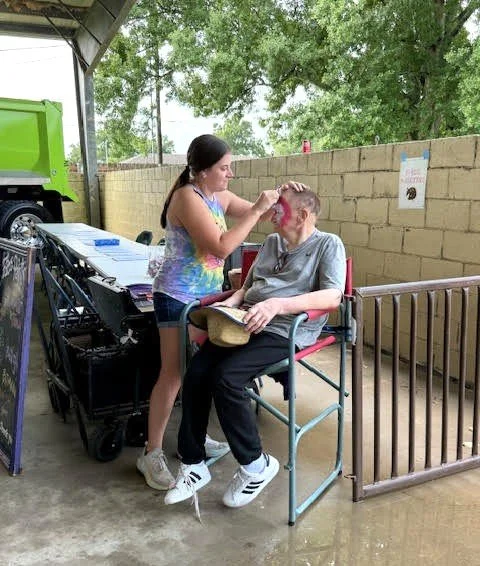  A volunteer for the FFA Special Needs Rodeo provided free face painting for rodeo participants. 