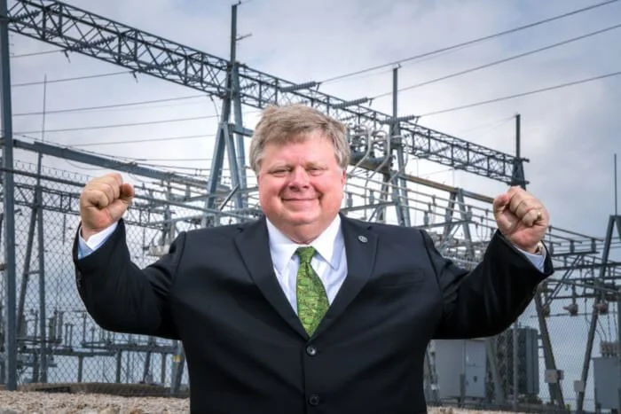 Georgetown-Mayor-Dale-Ross-in-front-of-power-plant.jpg