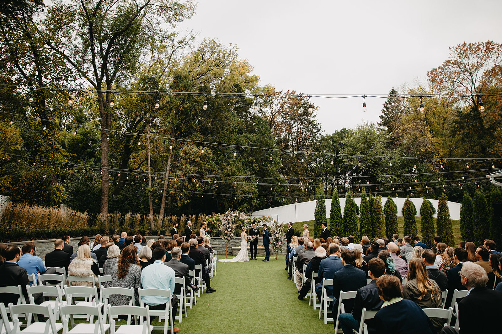 22 Wedding Day Ceremony Hutton House Outdoor Cafe Lights.jpg