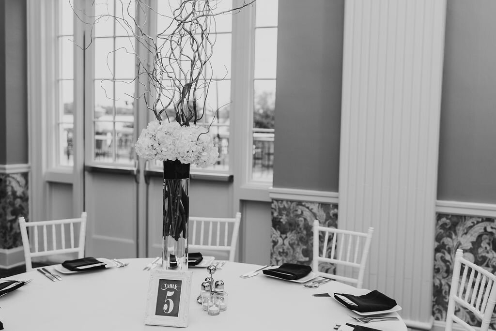 21 Wedding Reception Centerpiece Florals White Chiavari Chairs.jpg