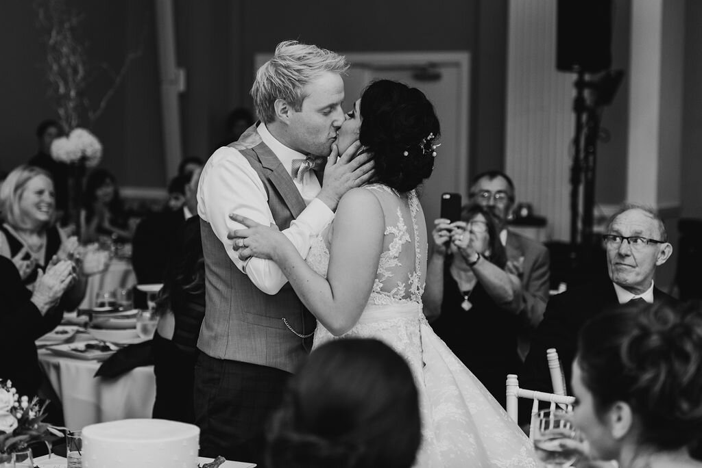 32 Bride Groom Wedding Day Kiss Reception.jpg