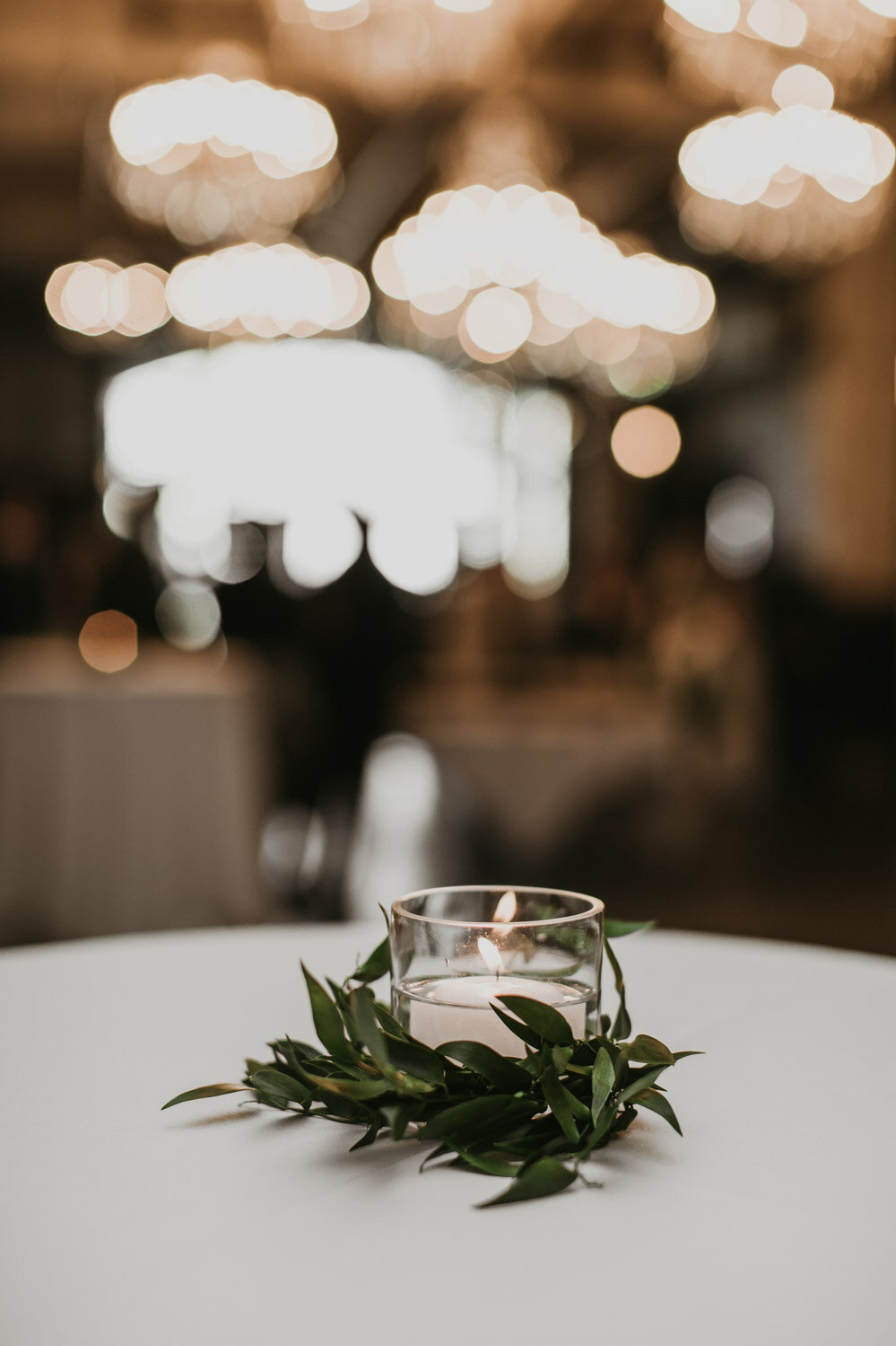 20 Wedding Day Decor Cocktail Tables Candles Greenery.jpg