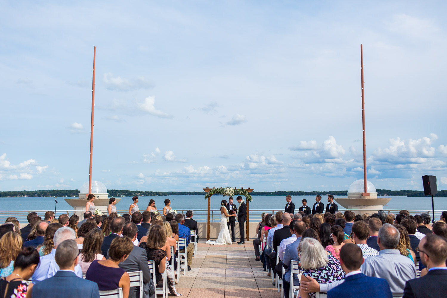 17 Wedding Ceremony Arbor Guests Water.jpg