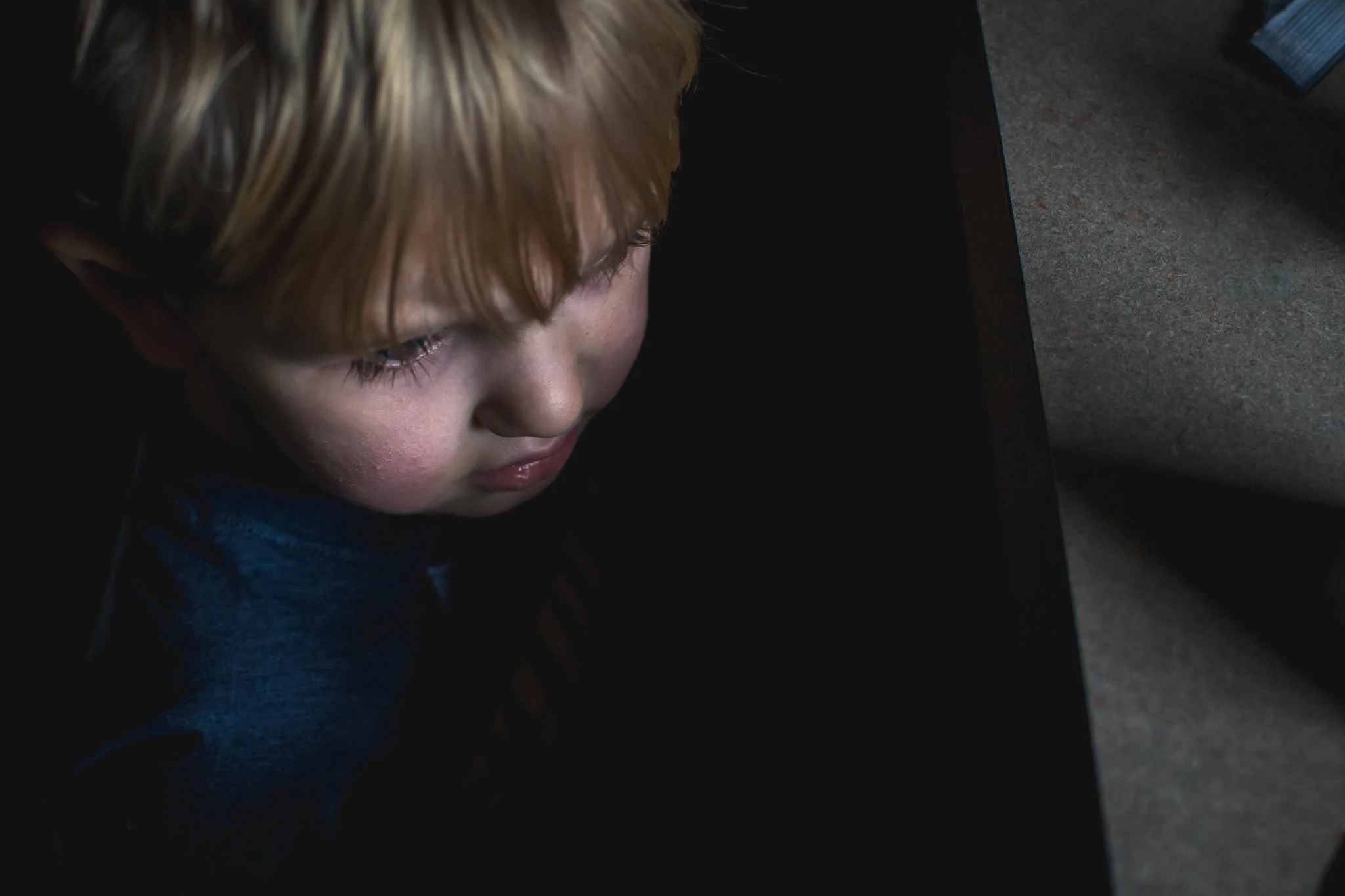 The details of his eyelashes. His moody look (God is this child ever moody.) But the details you don't see are pictured to the right. A great example of why sometimes detail shots can even be effective from a further viewpoint. 