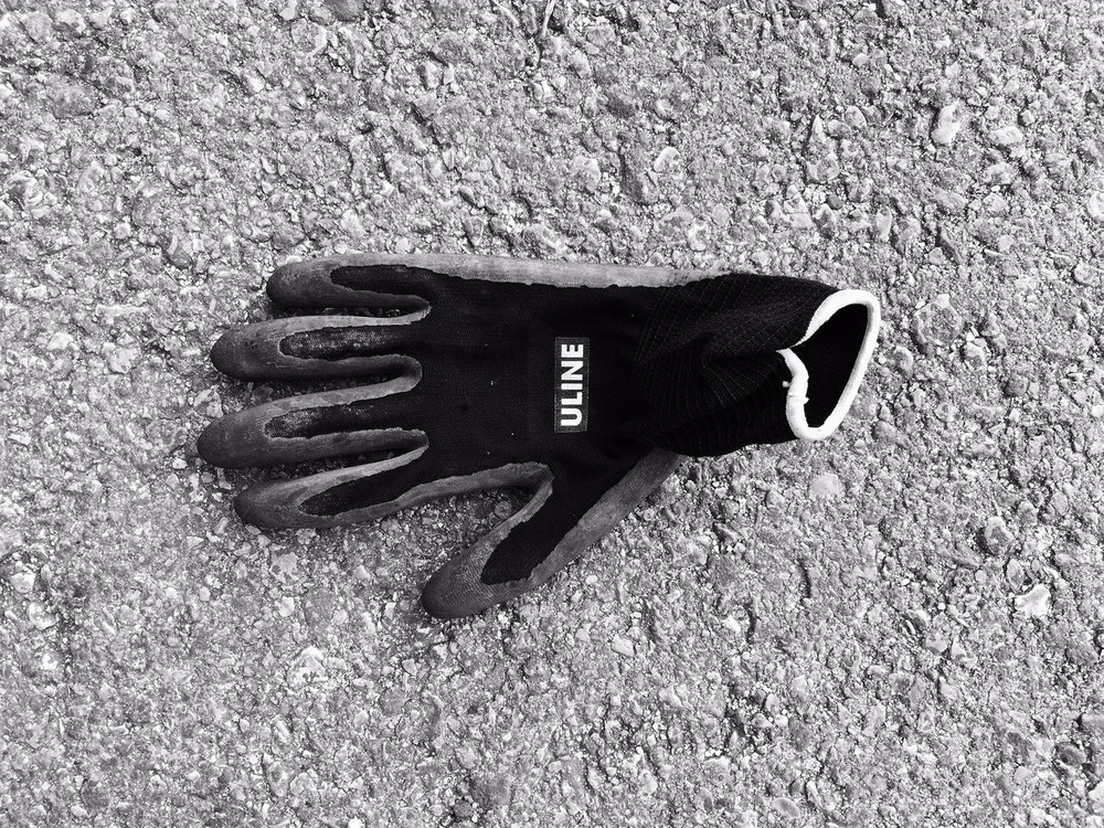  The ubiquitous safety glove, surprisingly new,&nbsp;found on the side of a busy feeder road.&nbsp; 