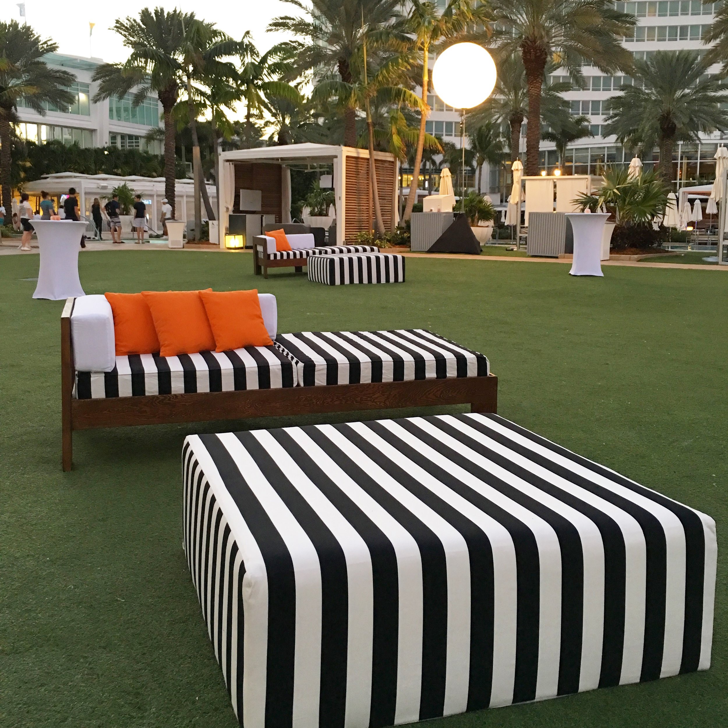 Cabana style sofa with black and white stripes at an event in the Fontainebleau hotel in Miami