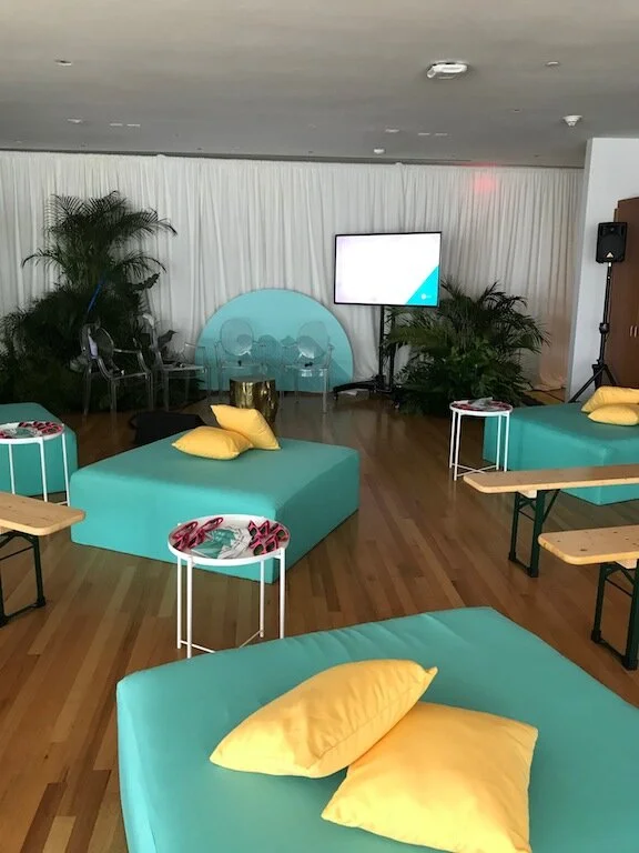 Ottomans for rent. Bold colors for cool conferences