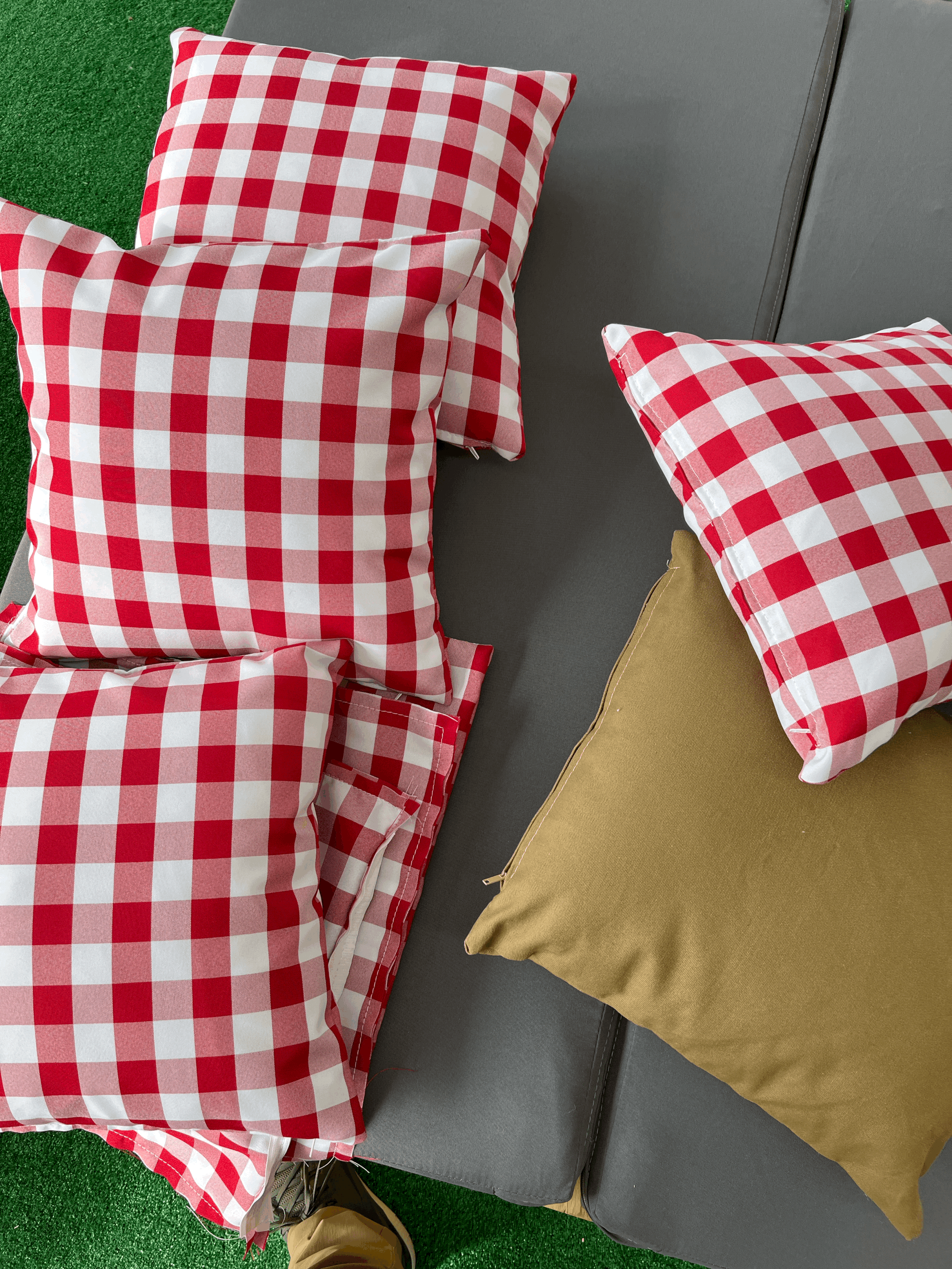 Red Gingham accent pillows for rent