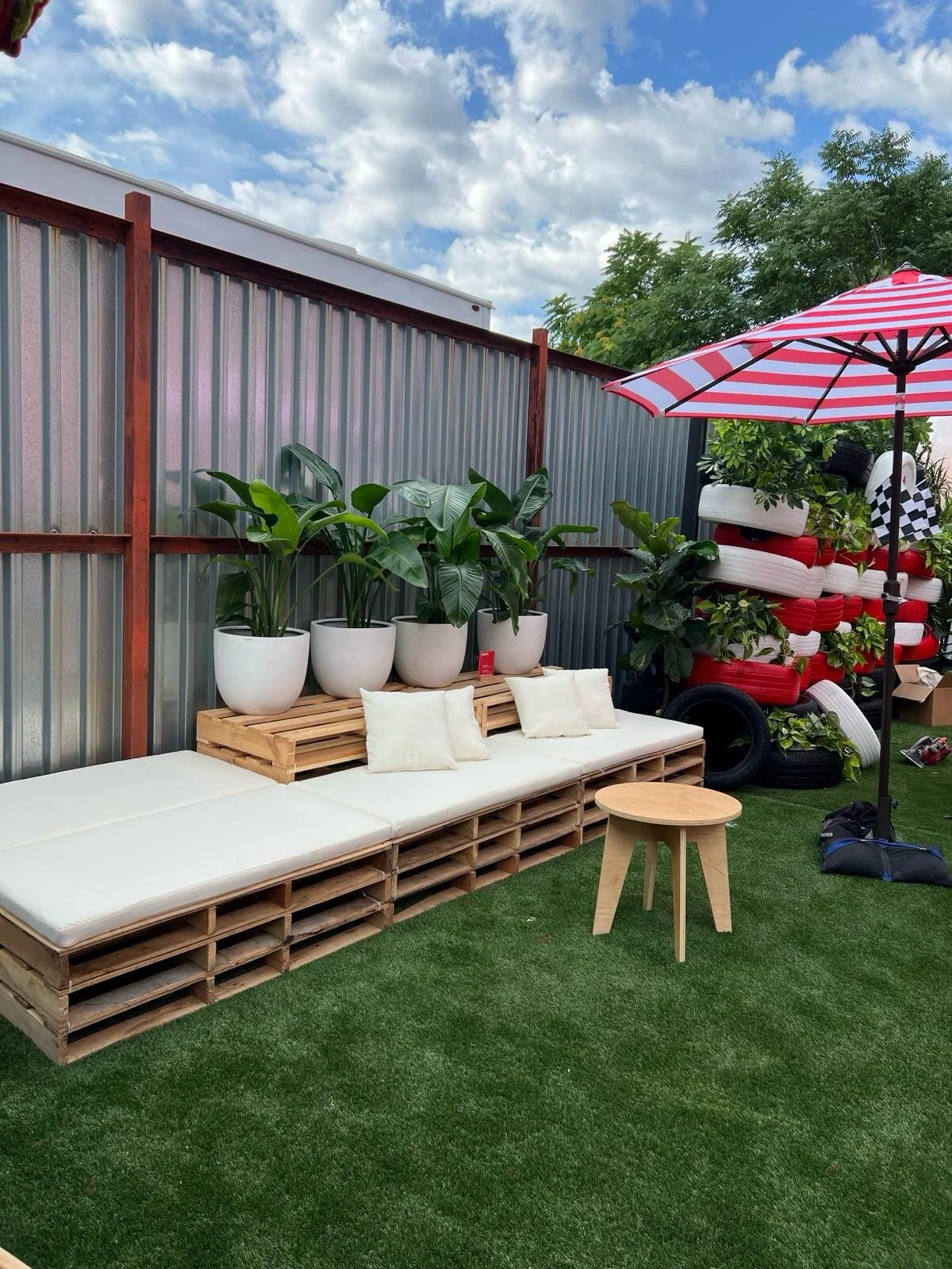 Outdoor event in Brooklyn with furniture and umbrellas