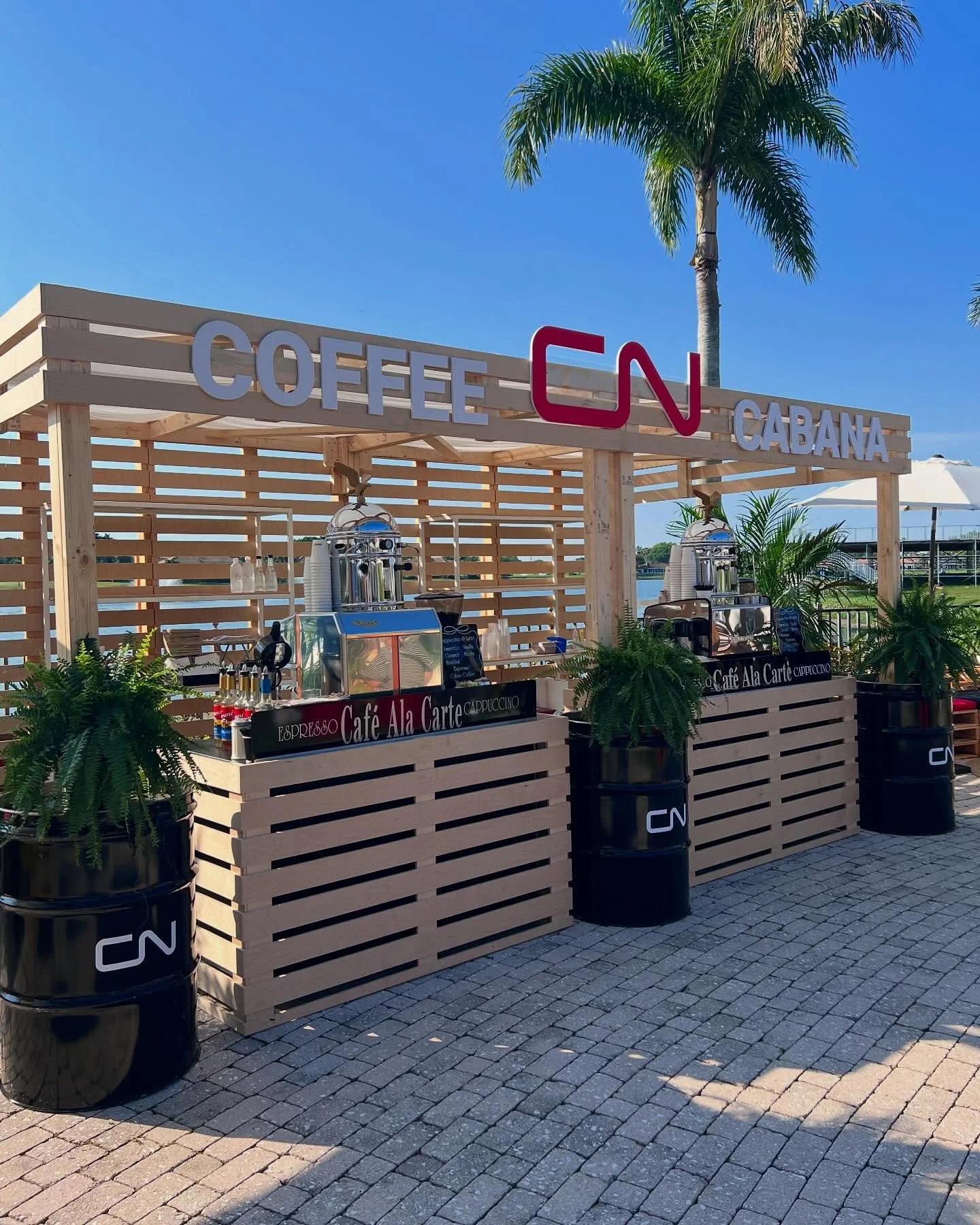 The Coffee Cabana 🌴☕️

Custom-built for Canadian National Rail&rsquo;s corporate event in Palm Beach- blending the brand&rsquo;s industrial DNA into an outdoor gathering spot: raw wood slates, branded barrels, and CN&rsquo;s signature red
#eventsdes