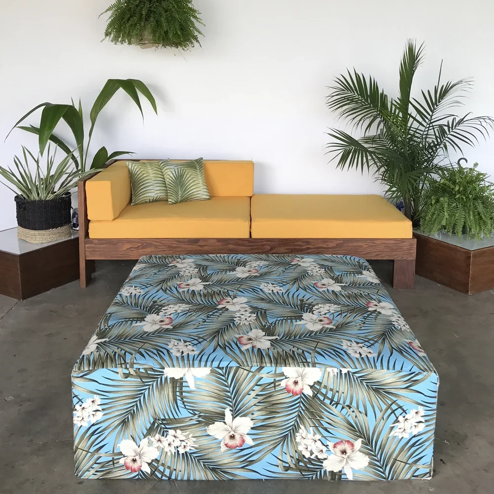 A Lounge Chair for outdoor events with Mango covers and tropical style accents