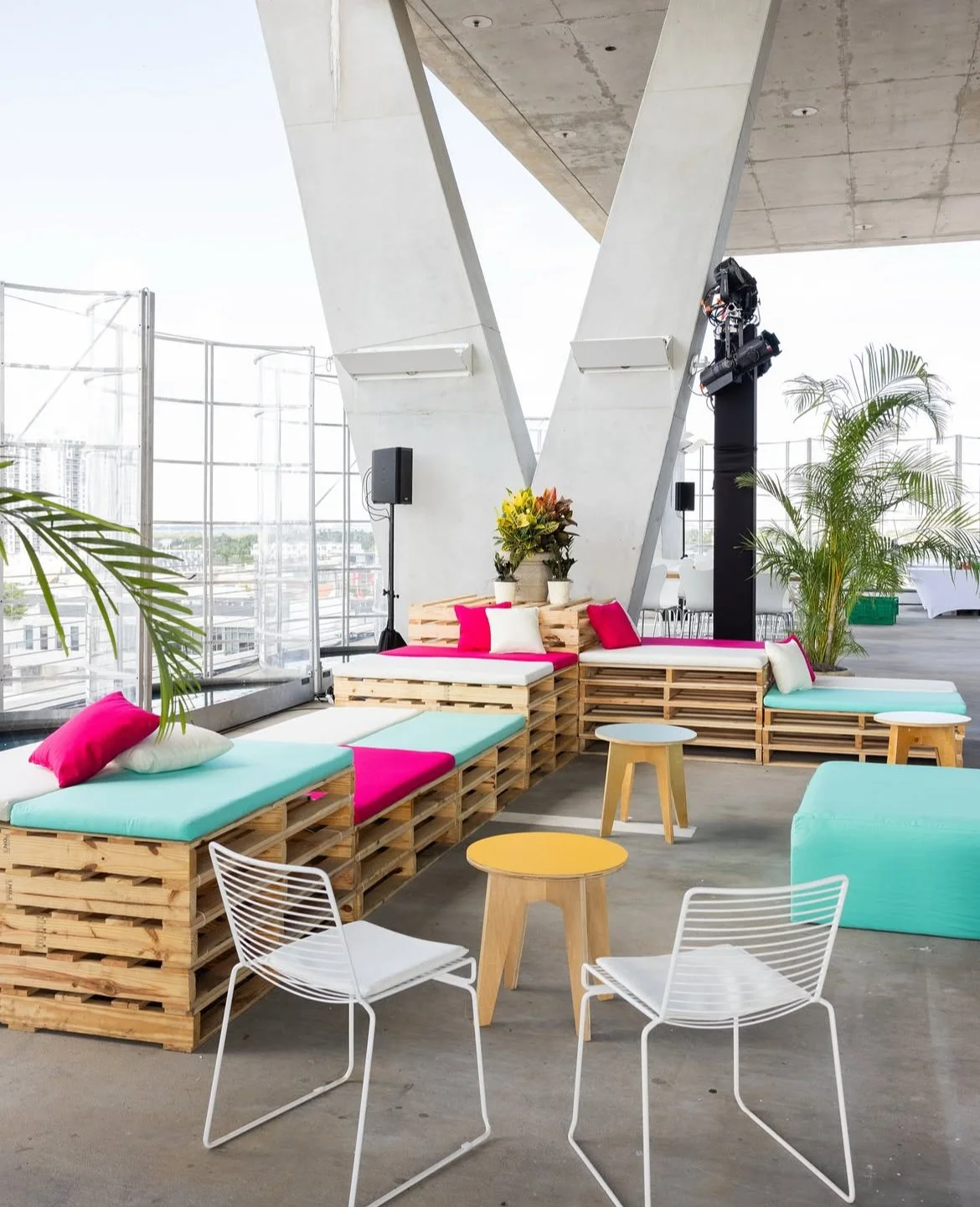 Pallet Furniture with colorful cushions at a conference in Miami