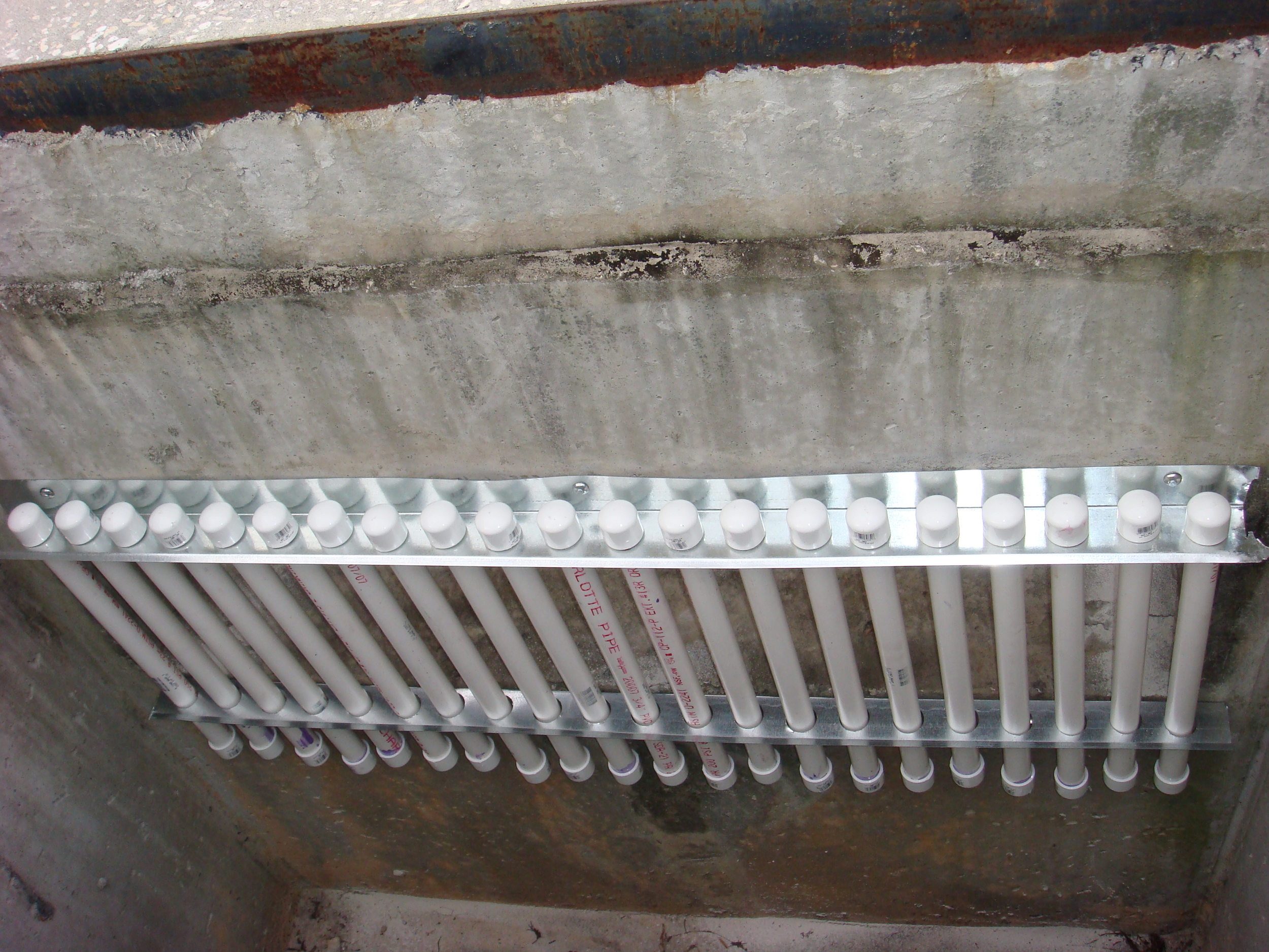 Triploid Grass Carp barrier installed over weir of a stormwater pond