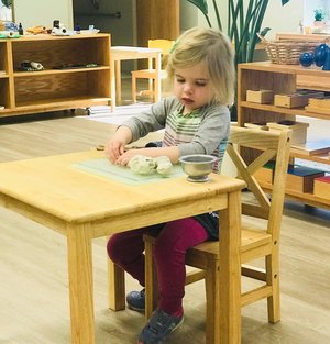 Child Working With Clay