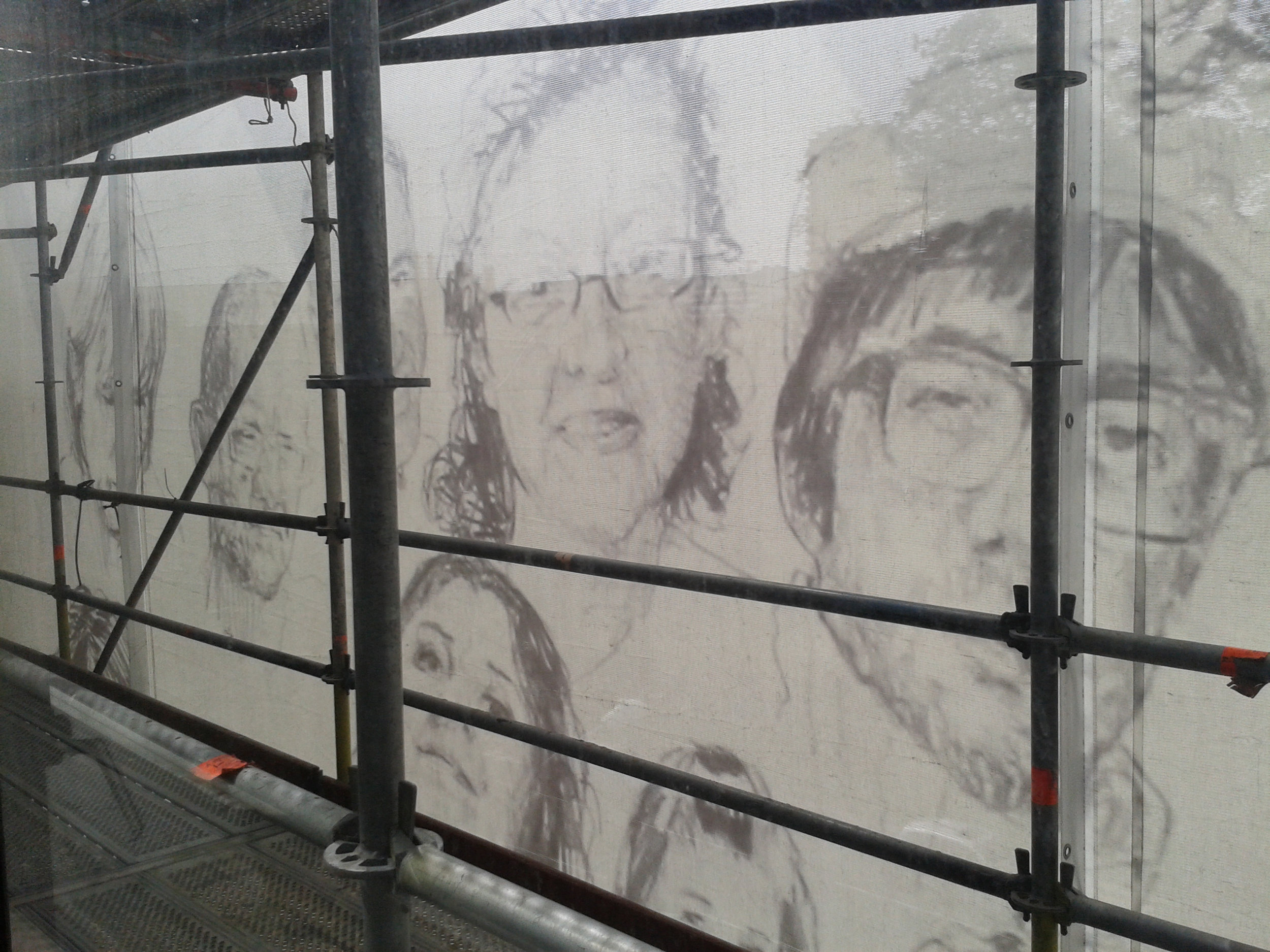 Portait of the artist from behind the Facade.jpg