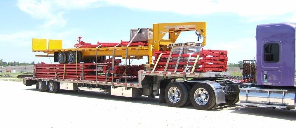Another Colorful Load of Trailers Heads Out!