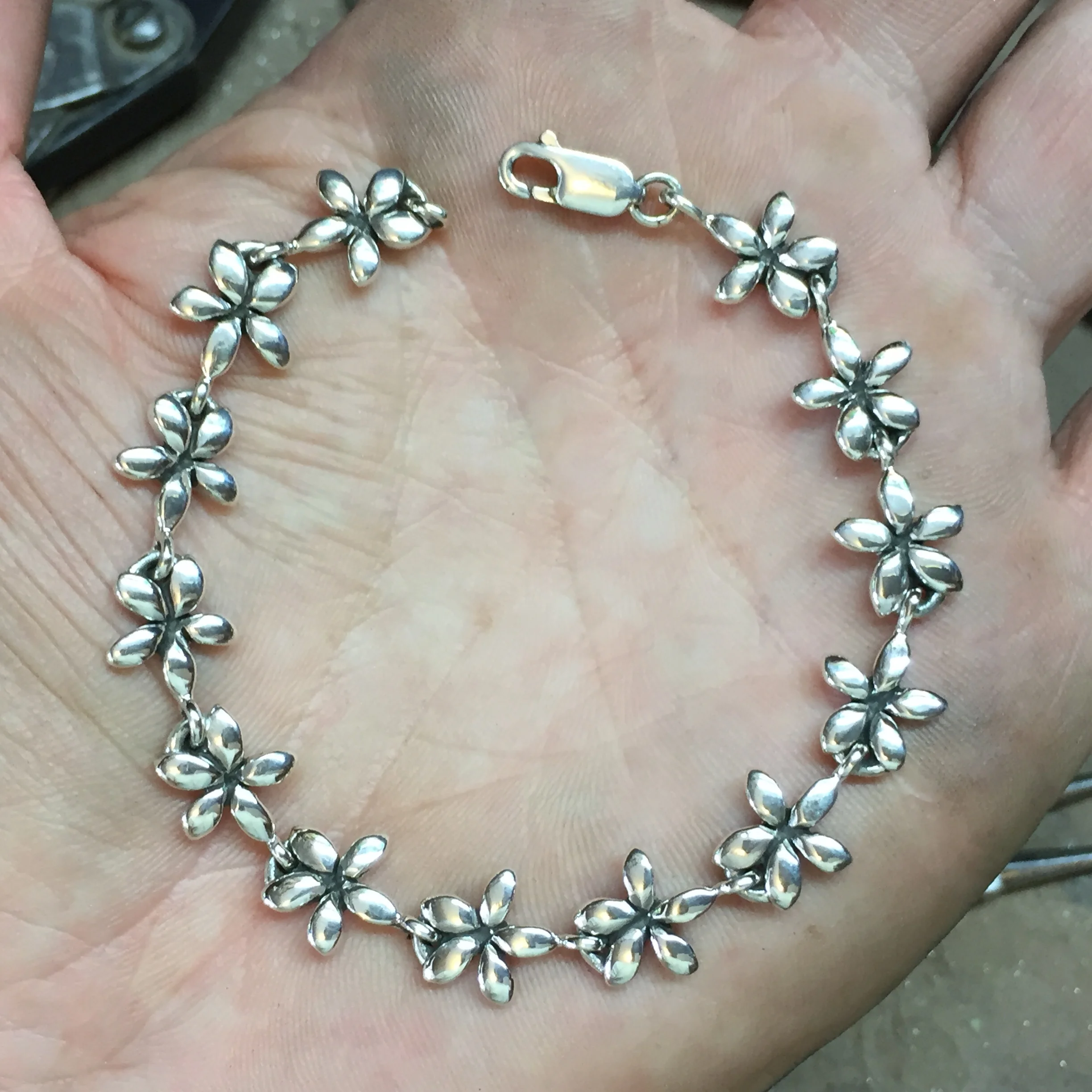 FrangipaniBraceletOnLeafsss1000.jpg