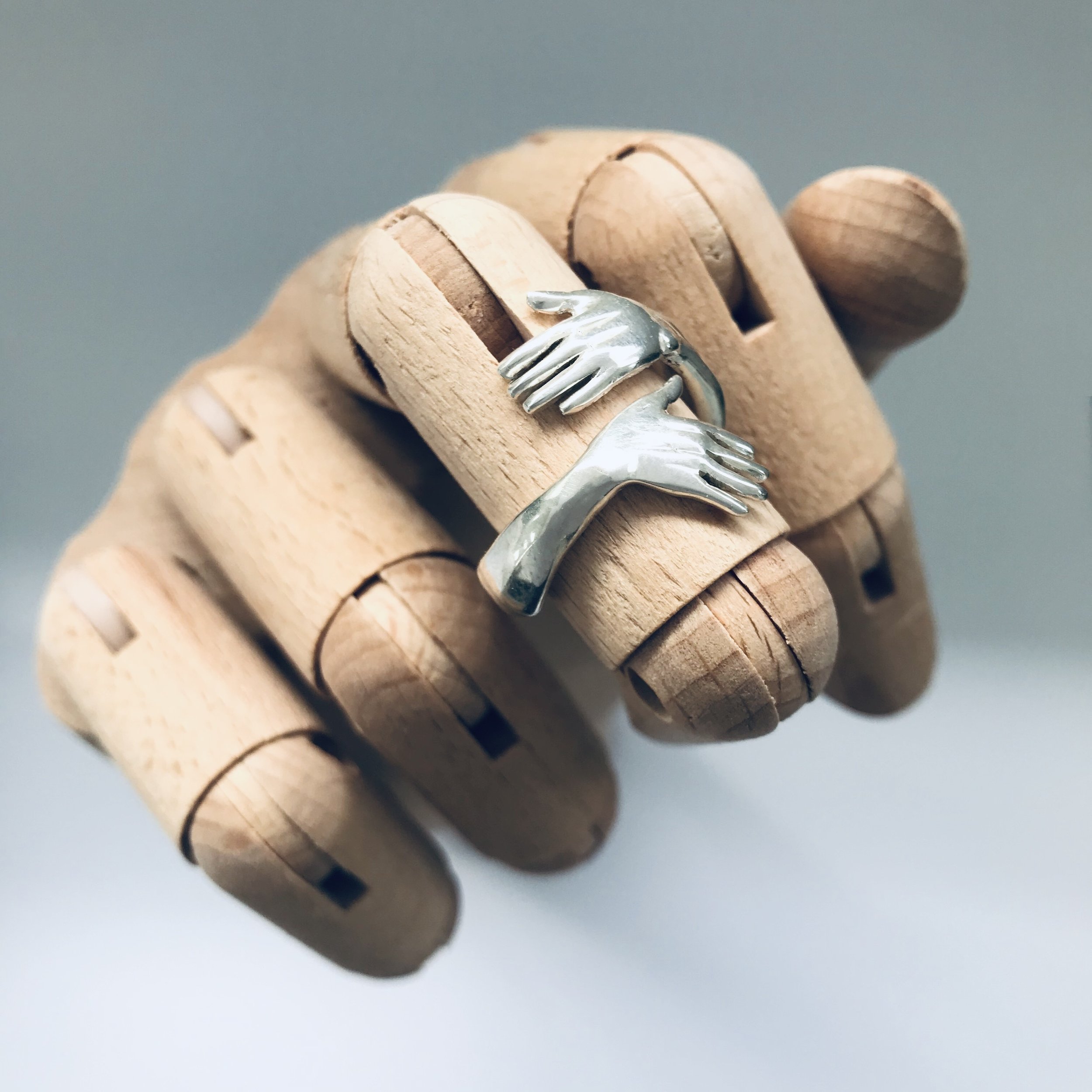 Hug Ring on Hand (1).jpg