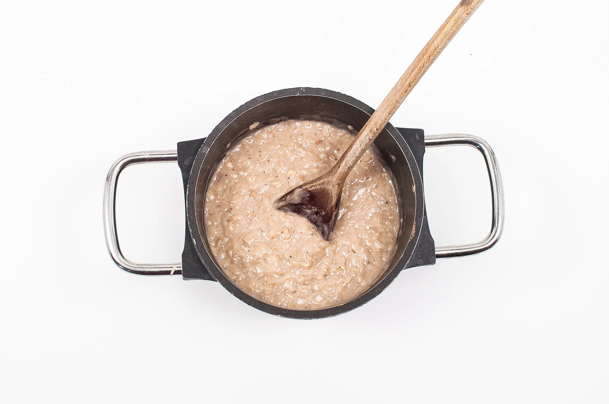 Once it has come to a boil, reduce the heat to a simmer and start stirring regularly for a creamy result.