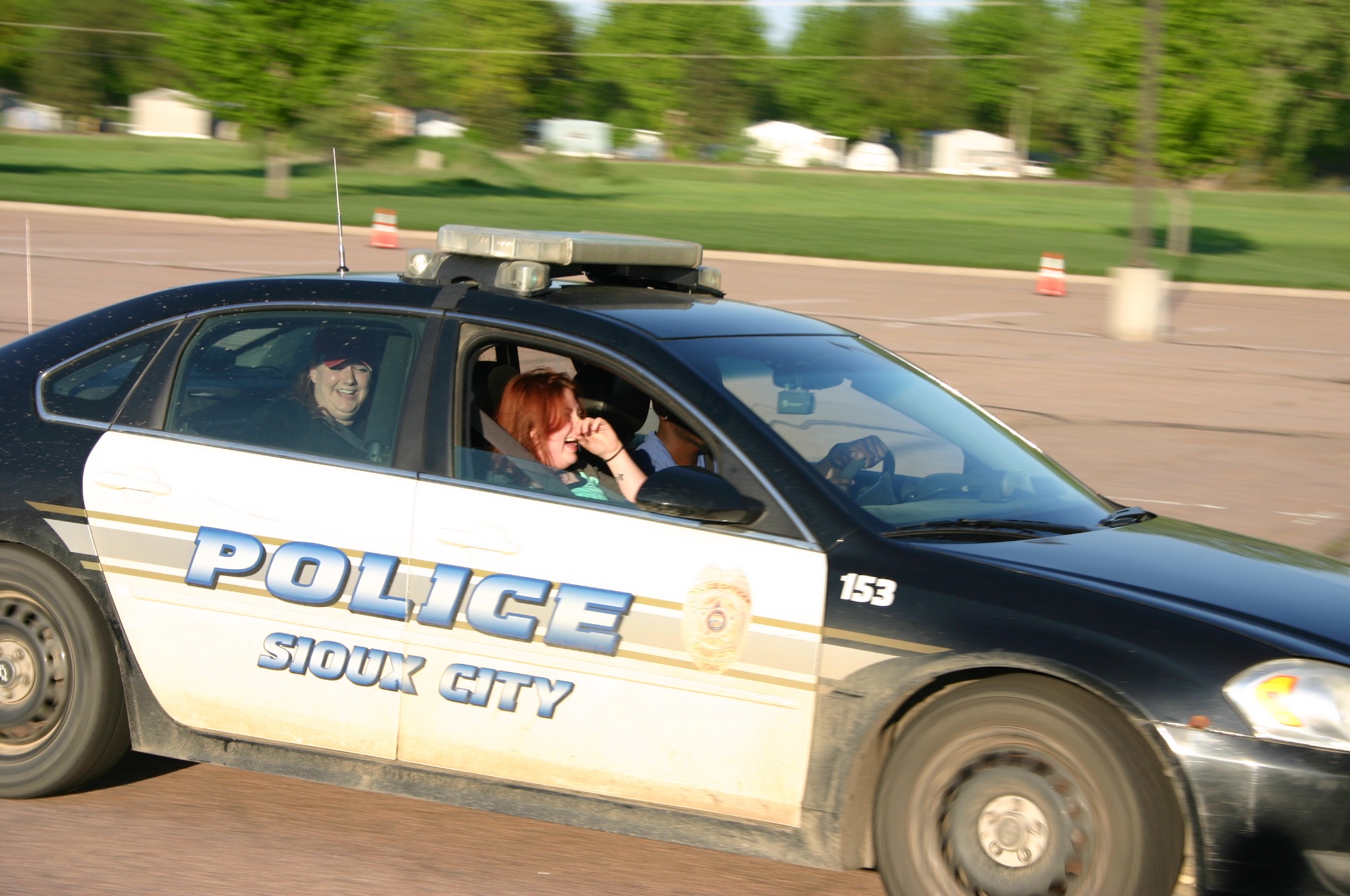 Participants learn about pursuit driving. 