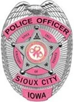 Officers can also purchase for wear a pink version of the department’s badge.