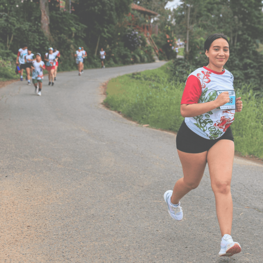Woman running the Monsal Trail 10K run
