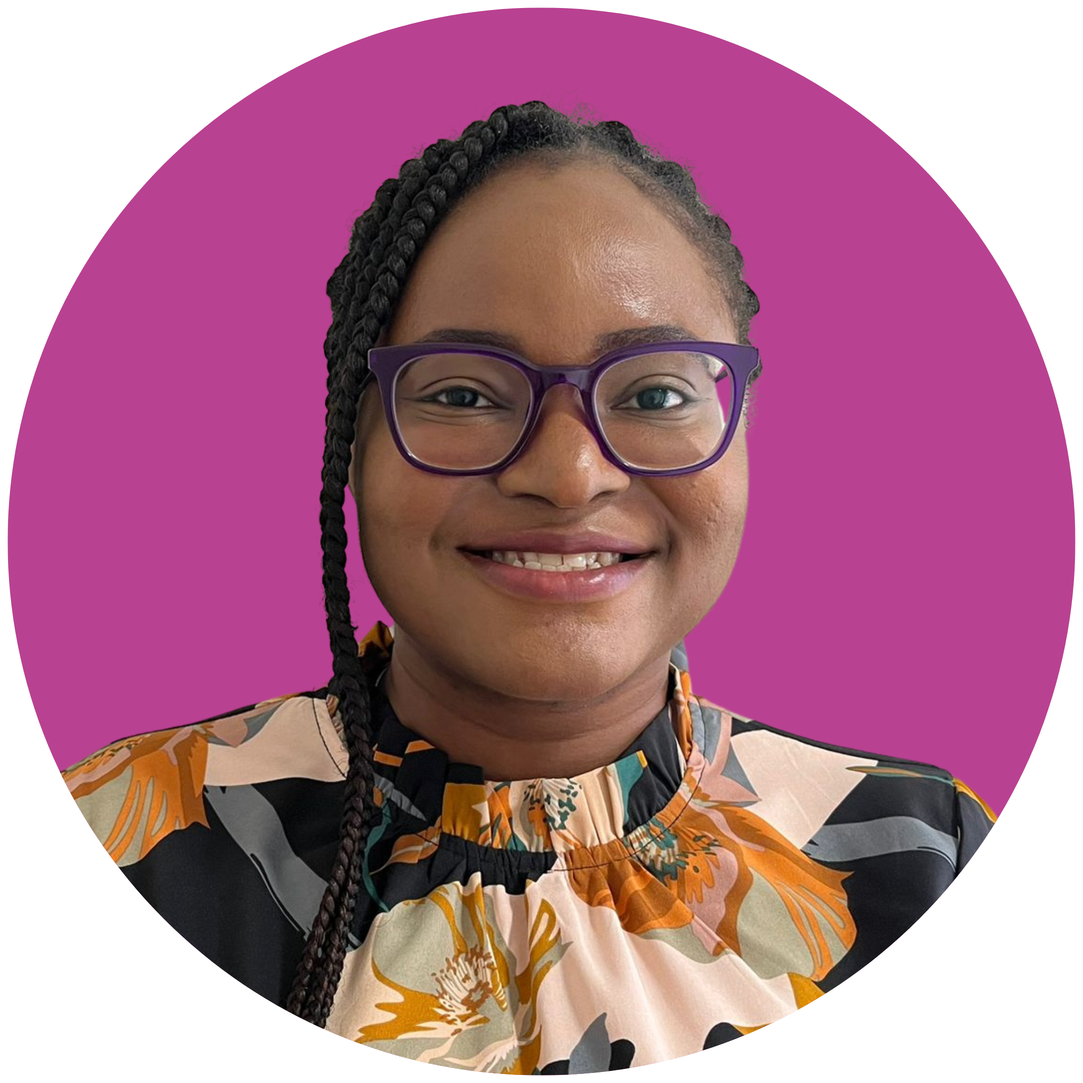 A woman with braided hair and glasses smiles at the camera. She is wearing a black floral top and is set against a purple background.