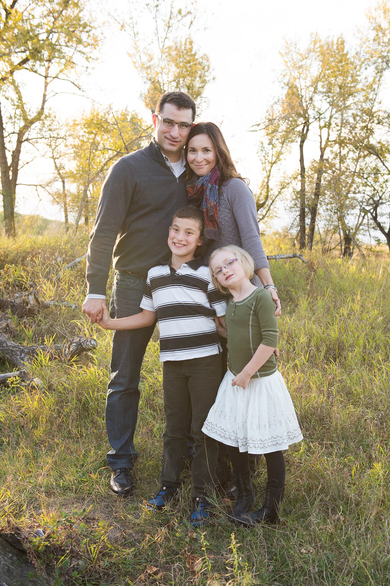 Family of four posing for fall portrait.jpg