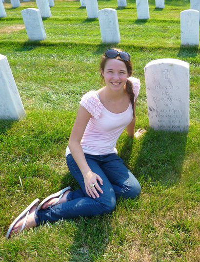 Bella Blackney at father's headstone.jpg