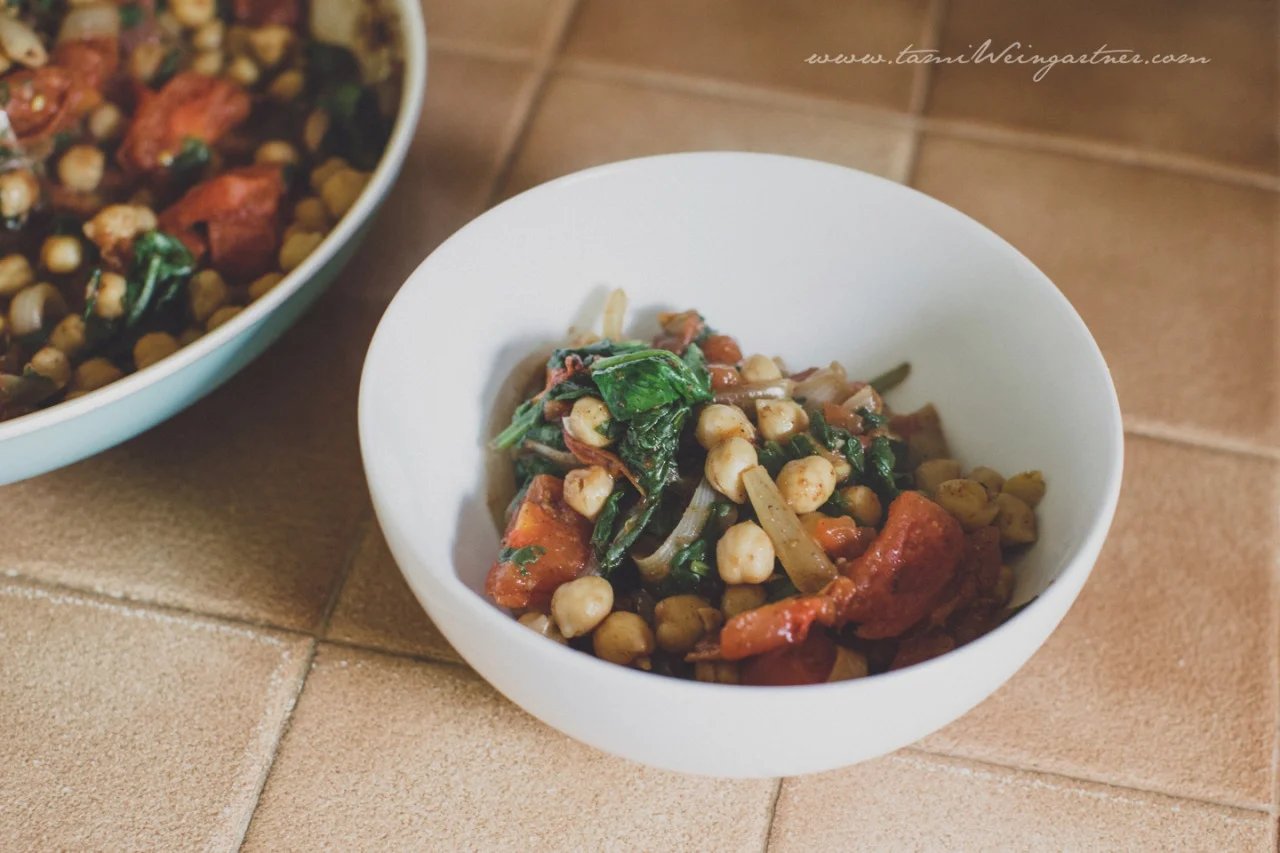 Channa Saag If you found this recipe from Rust Belt Lifestyle magazine Book One. Welcome! Channa Saag is one of my very favorite cold weather recipes. It has lovely warm spices and is made in one saute pan in less then 20 minutes. Perfect for lunch for two or a quick last minute meal for unexpected company. Don’t get to exact with the recipe. A little more or less chickpeas. Adjust the spice to your liking. Etc. 1 Medium size onion, sliced into matchsticks 3 cloves of garlic, sliced thin 1 inch of peeled ginger, grated 6 Roma Tomoatoes (or 8, or a can whatever is on hand), chopped 1-2 teaspoons each (per taste) of Cardamon, Cinnamon, Coriander, & Gram Marsala 1/8-½ Cayenne Pepper (per tasts) 12 oz of Chopped Spinach 2 Cups of Garbanzo Beans Water Saute onion, garlic & ginger. Add tomatoes and spices and cook 5 minutes. Add Chickpeas and cook 5 minutes. Add spinach, stir through then cover to wilt. Serve immediately with rice or alone. Keeps good in the fridge for a couple days.