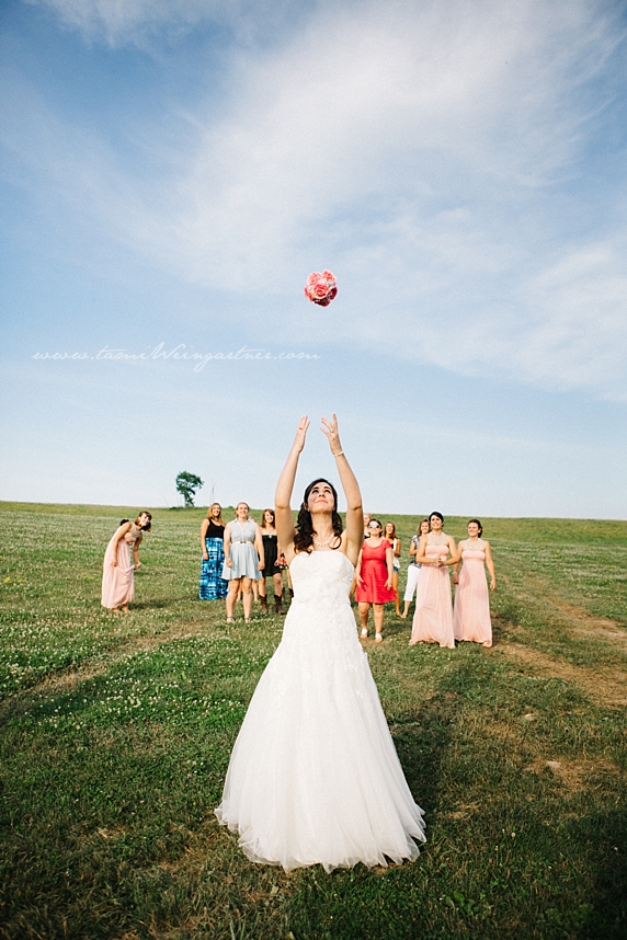 The most epic bridal bouquet toss ever