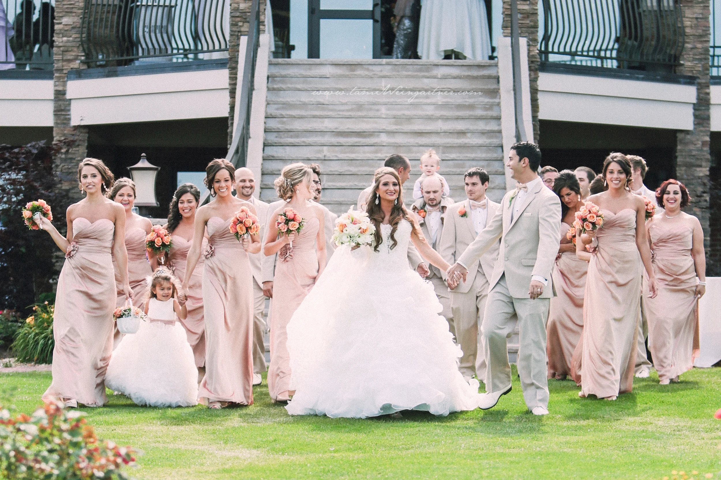 Bridal party in front of the terrace at the lake club in youngstown oh