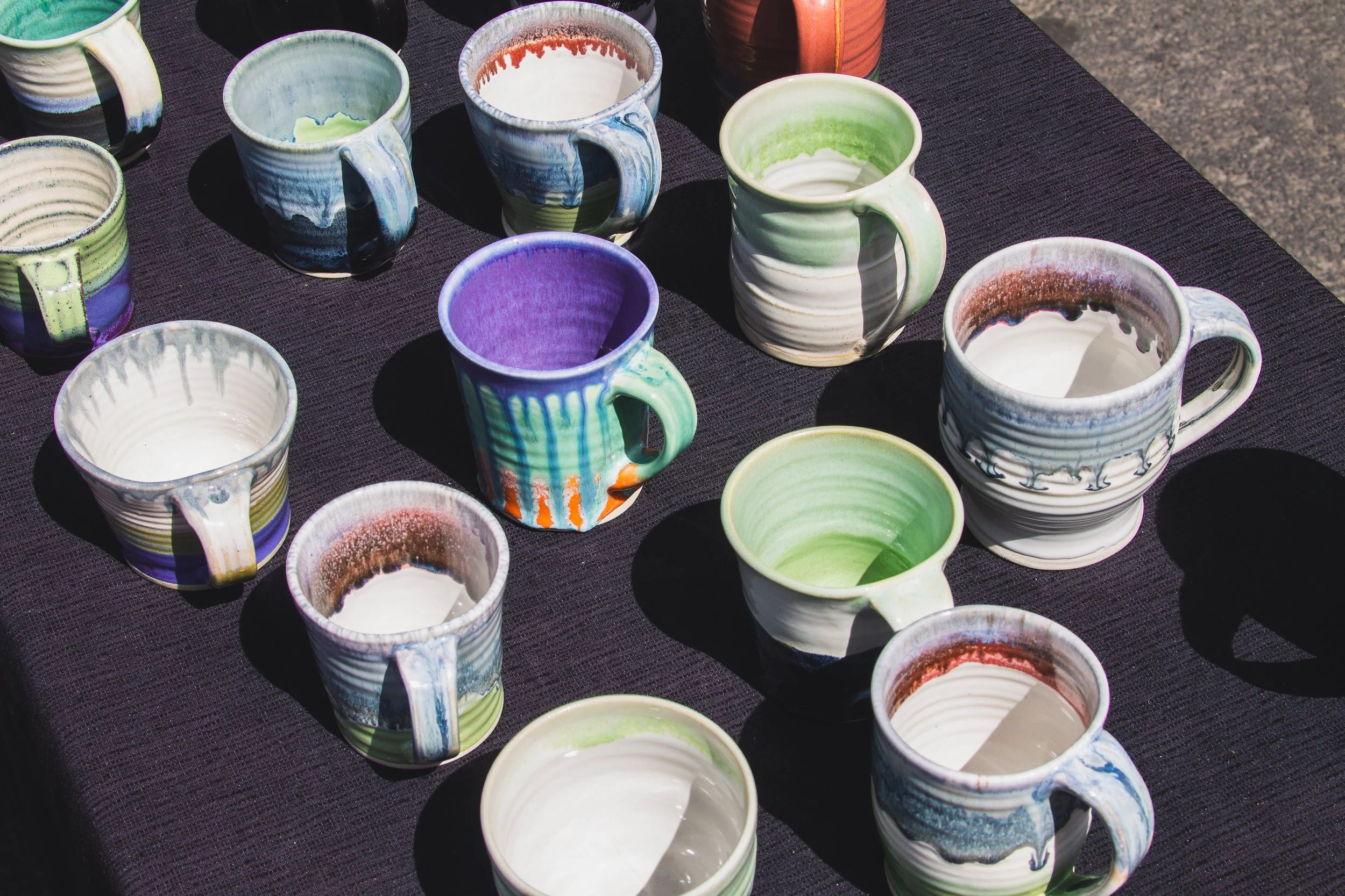 Ceramic artists sell handmade mugs at Farmers' Market on May 9.jpg