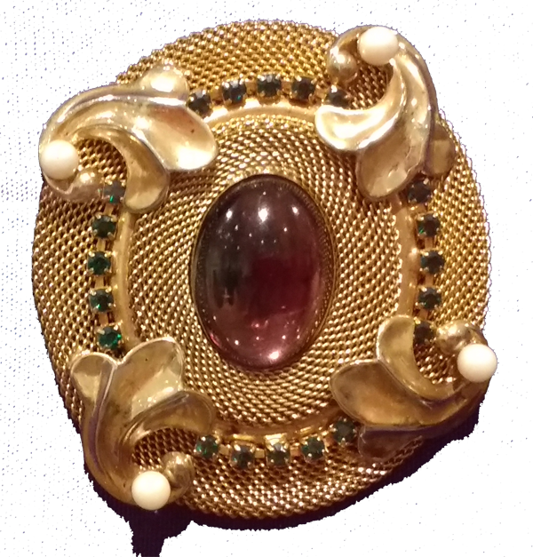 Suffragette Pin from the early 20th century. It was in the collection of Madeline Albright and shown in the exhibition and book "Read My Pins." 