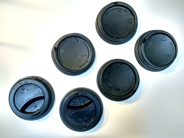 Black plastic coffee cups lids