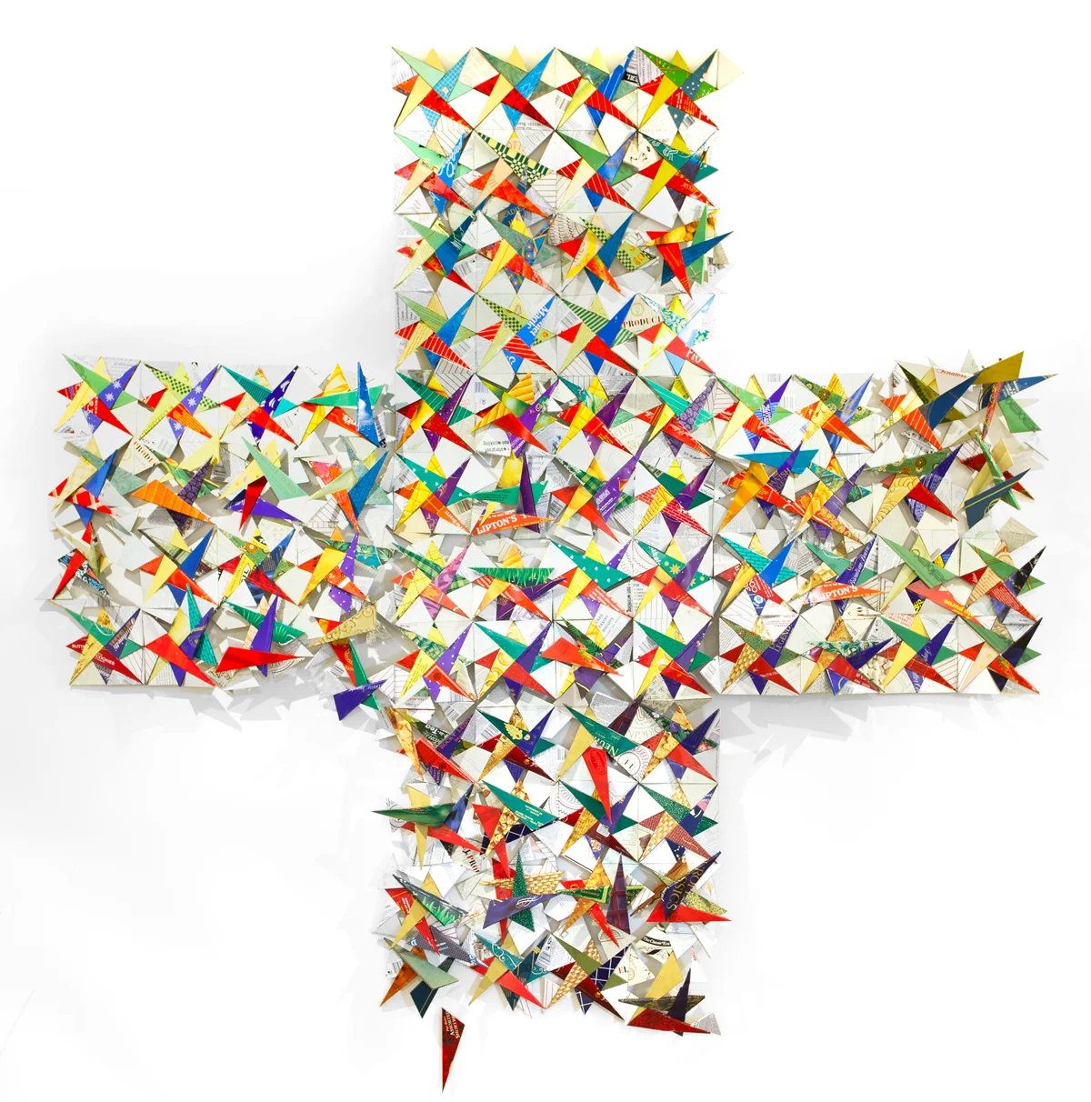 Quilt constructed from recyled materials tin cans