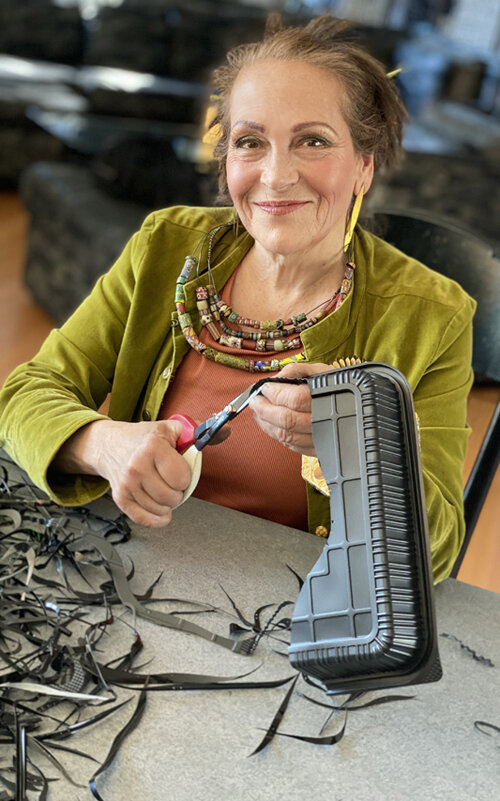 Harreite Estel Berman cutting on black plastic 2021. Photo Credit Aryn Shelander.