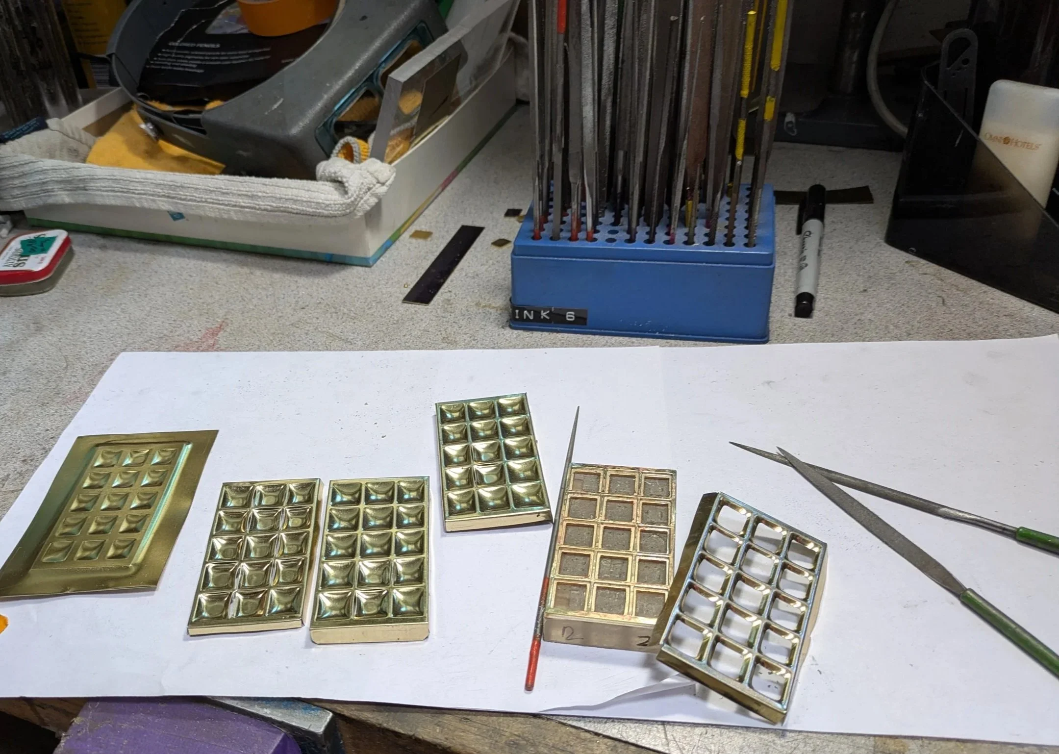 The windows are in just the beginning. I have about 20 of them, but there is still a lot of work to go. Everything is made out of recycled tin cans. The form is brass and Plexiglass to press each window.