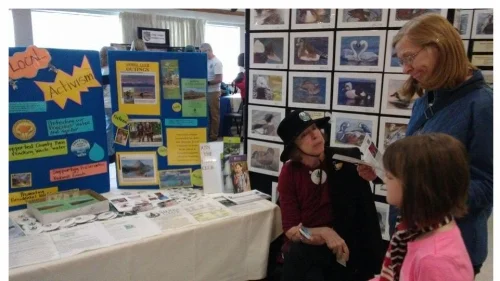 Here I am tabling with Sierra Club - handing out PCF brands not to buy flyers I had made along with my biz card - to all Moms and Grandmothers with kids who stopped by our booth.
