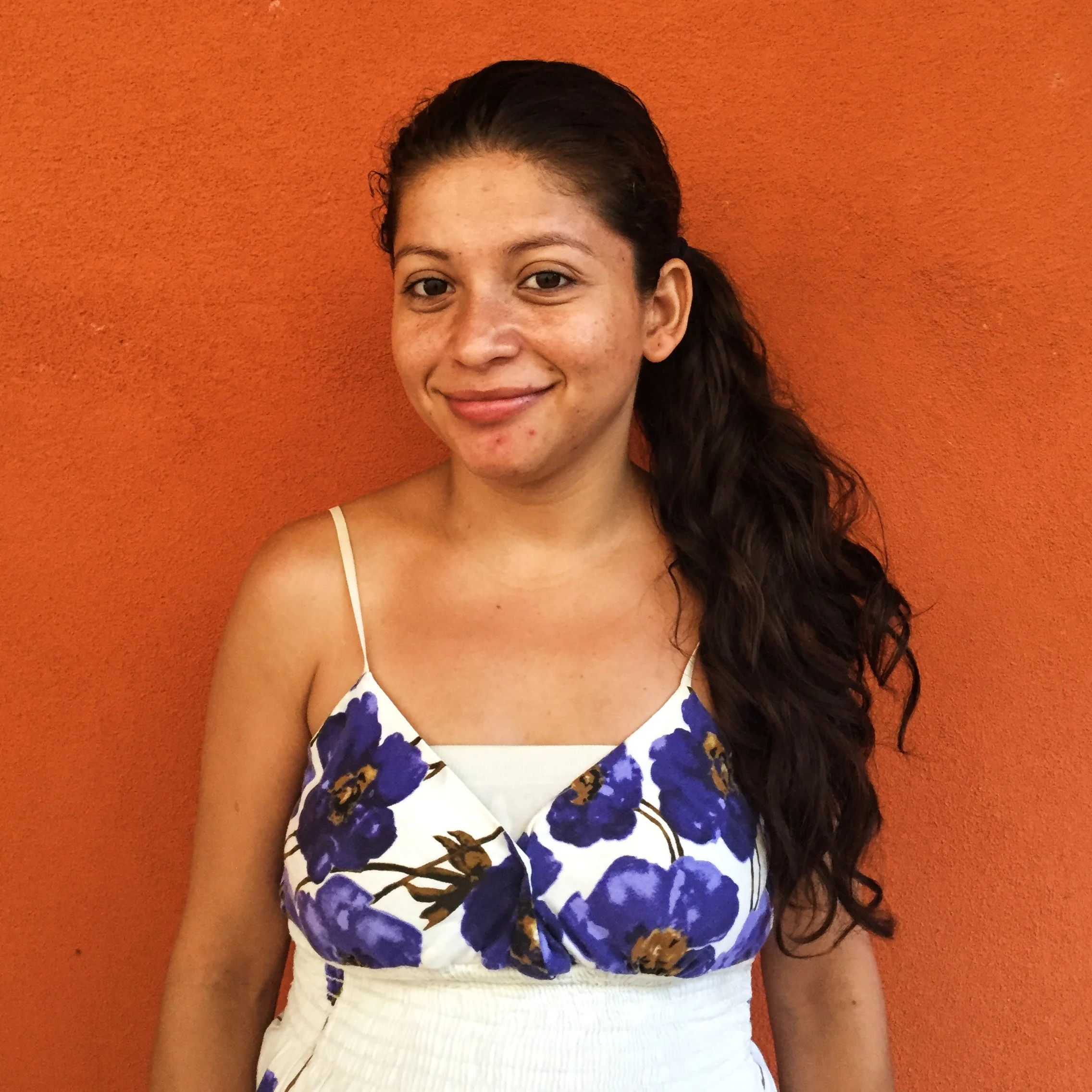 Maria - housekeeper and villa-beautifier. Don't miss her towel art in your room!