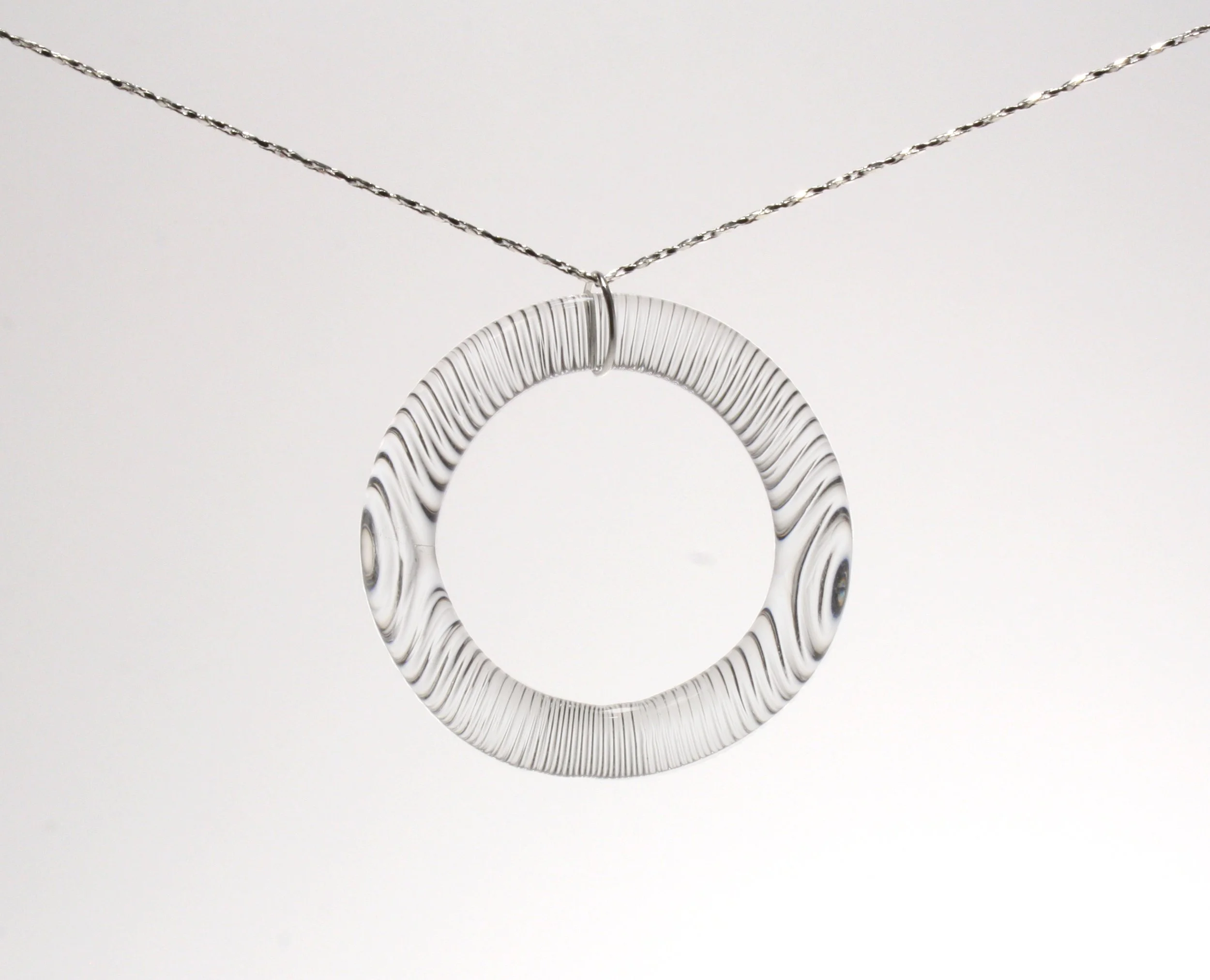 Rounded vertically cut pendant