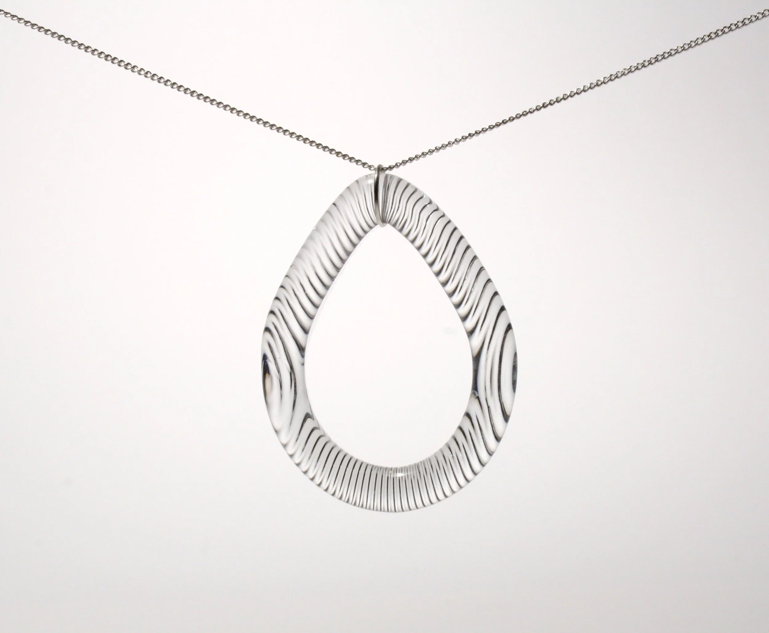 Teared vertical cut pendant