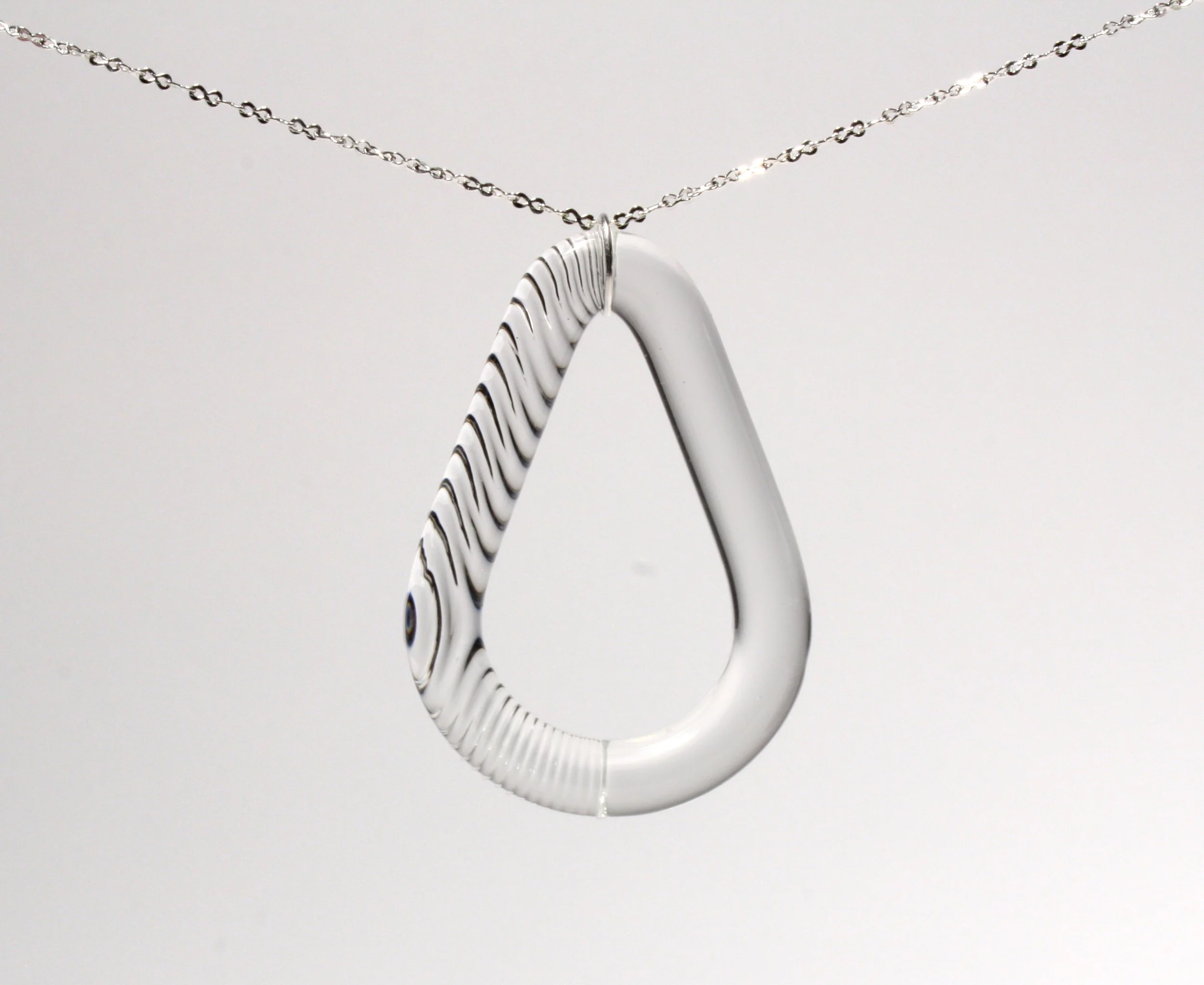 Teared side cut pendant