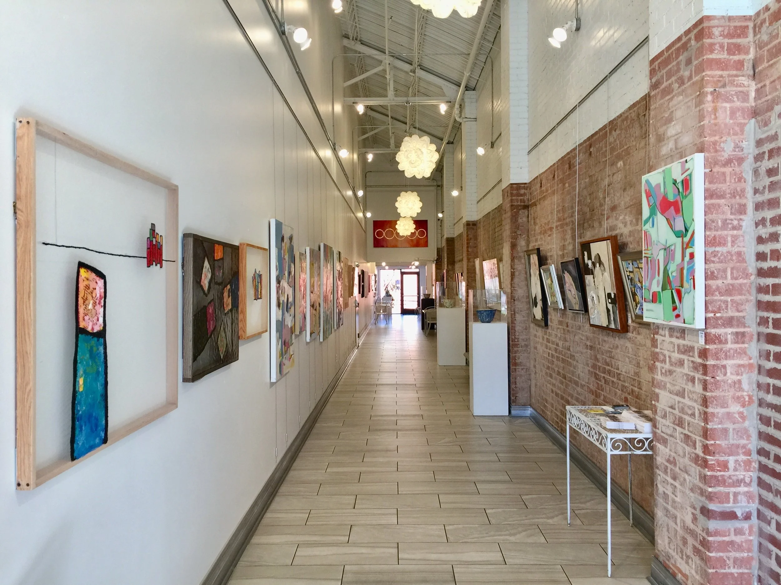 Installation view, facing North, of Fringe Women Artists of Oklahoma at The Art Hall. Featuring alexis austin on the left, and Mary James Ketch and Katie Henderson on the right. 