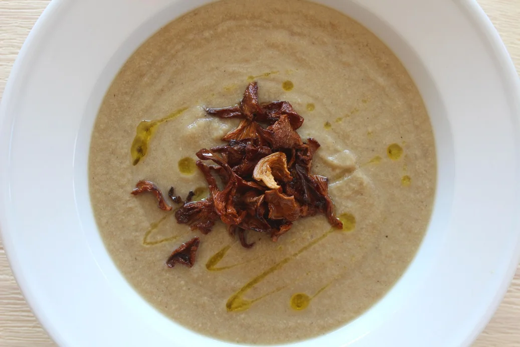 Creamy Mushroom Soup (Vegan) tastes like pure comfort food but is loaded with veggies and has no cream or half-and-half! It’s as easy as cooking onion, mushrooms, and potatoes in broth and blending until smooth with nondairy milk. The chanterelle mushrooms add both elegance and a peppery, earthy flavor.