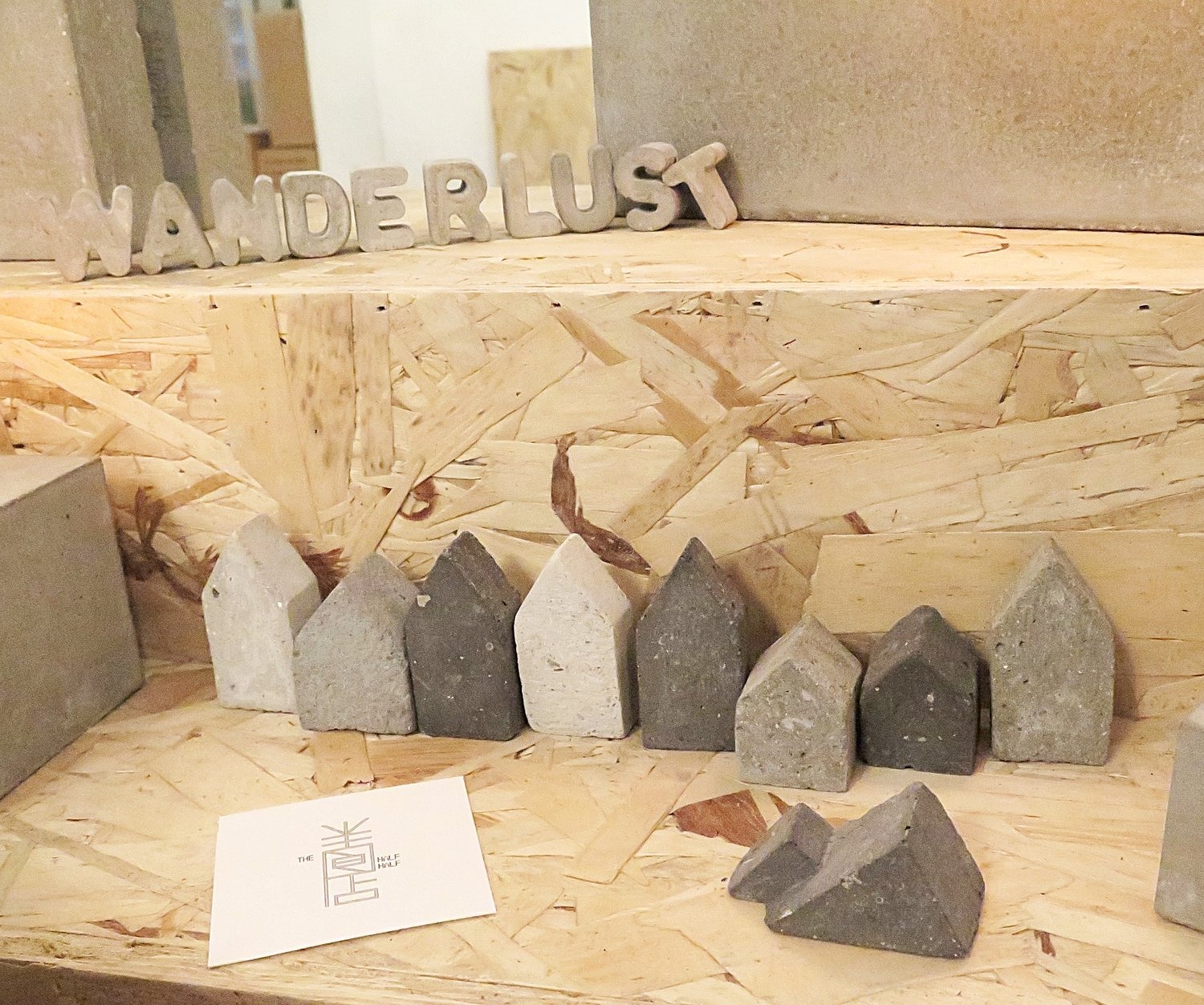 Handmade in Singapore by The Half Half studio . Two of these concrete miniature houses and the Wanderlust letters came with me, all around the world, to Brooklyn. Souvenirs this small (about 2 to 3cm) were perfect to carry.